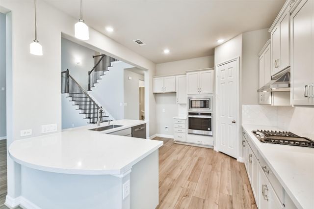 8211 Chartres Wind Drive, Magnolia, TX 77354