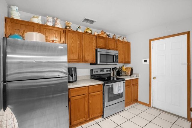 10303 WINDING CREEK LANE, Orlando, FL 32825