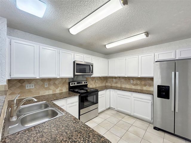 1638 Kingspoint Drive, Carrollton, TX 75007
