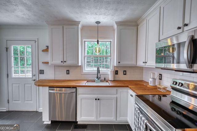 7190 Woodland Avenue SE, Covington, GA 30014