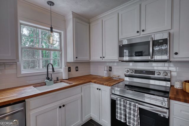 7190 Woodland Avenue SE, Covington, GA 30014