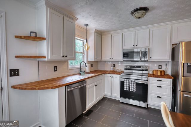 7190 Woodland Avenue SE, Covington, GA 30014