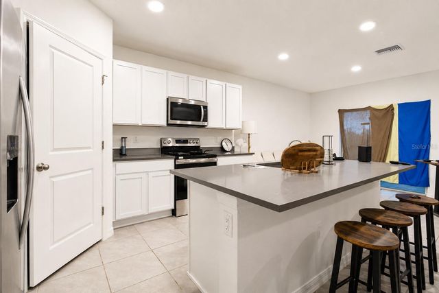 7108 BROAD RIVER AVENUE, Land O Lakes, FL 34638