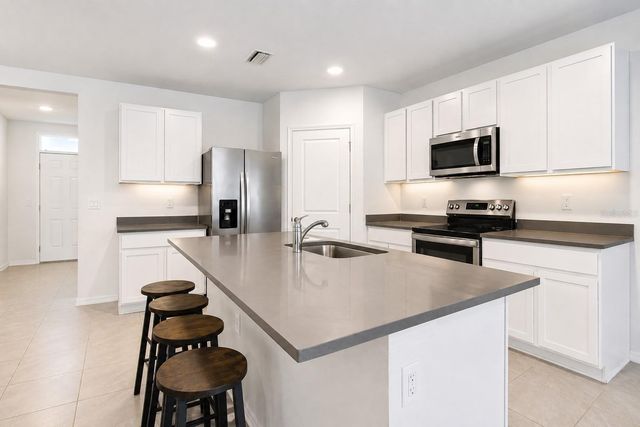 7108 BROAD RIVER AVENUE, Land O Lakes, FL 34638