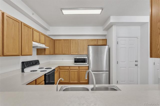 9758 Laredo Street 17E, Commerce City, CO 80022