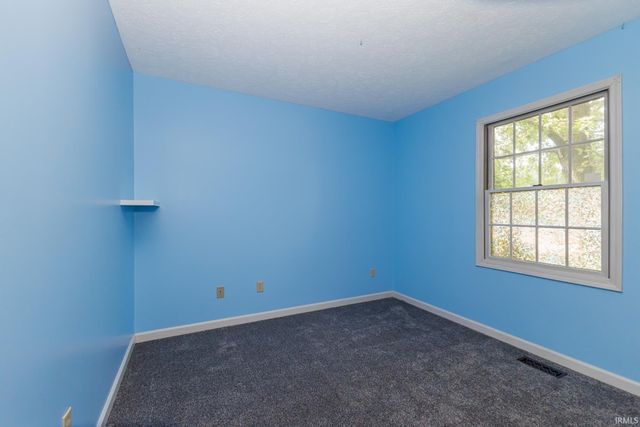 5000 W QUAIL RIDGE Drive, Muncie, IN 47304