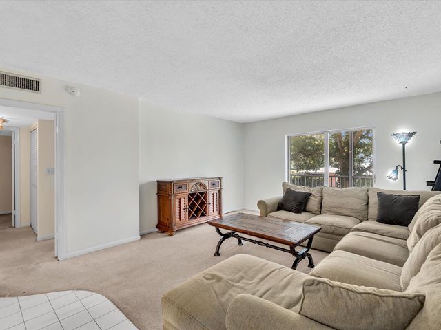 9101 W Sample Road 204, Coral Springs, FL 33065