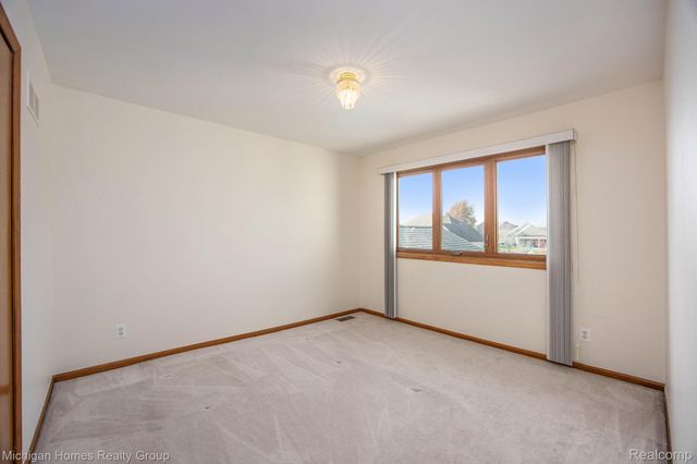 47630 Robins Nest Drive, Shelby Charter Township, MI 48315