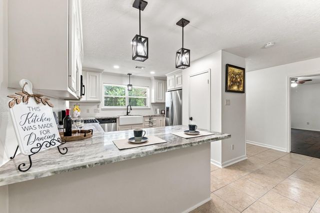 13185 Crest Drive, Willis, TX 77318