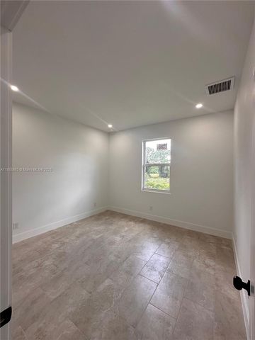 1073 Barnett St E, Lehigh Acres, FL 33974