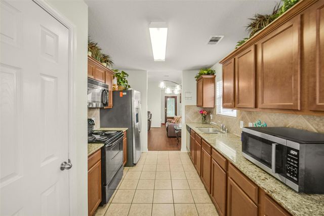 9035 River Dale Canyon Lane, Humble, TX 77338