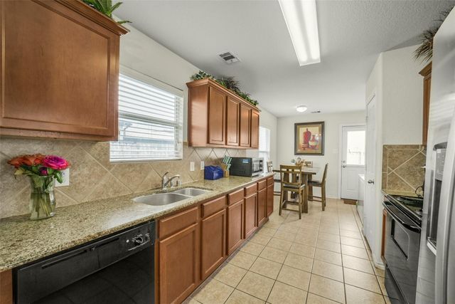 9035 River Dale Canyon Lane, Humble, TX 77338