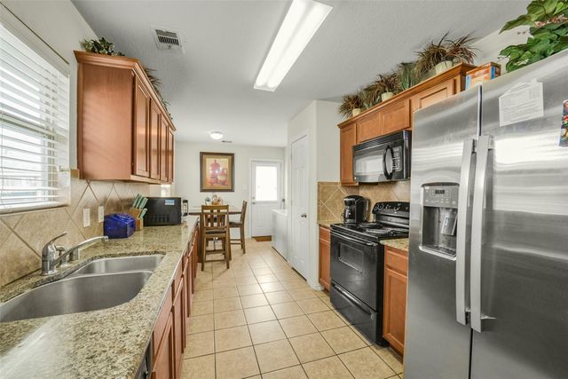 9035 River Dale Canyon Lane, Humble, TX 77338