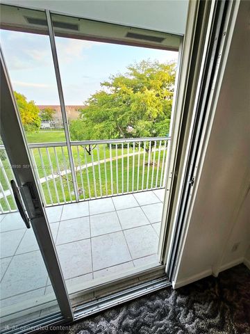 13250 SW 7th Ct 402L, Pembroke Pines, FL 33027