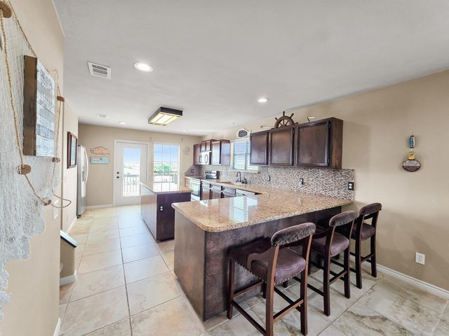 1301 N Monkhouse Drive, Crystal Beach, TX 77650