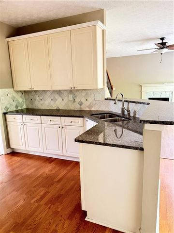 1064 Spanish Moss Court, Lawrenceville, GA 30045