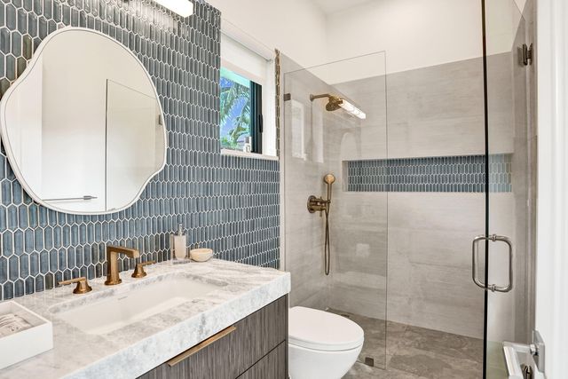 7 Tahoe Lane, Sea Ranch Lakes, FL 33308