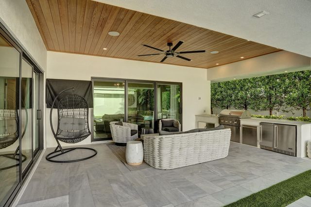 7 Tahoe Lane, Sea Ranch Lakes, FL 33308
