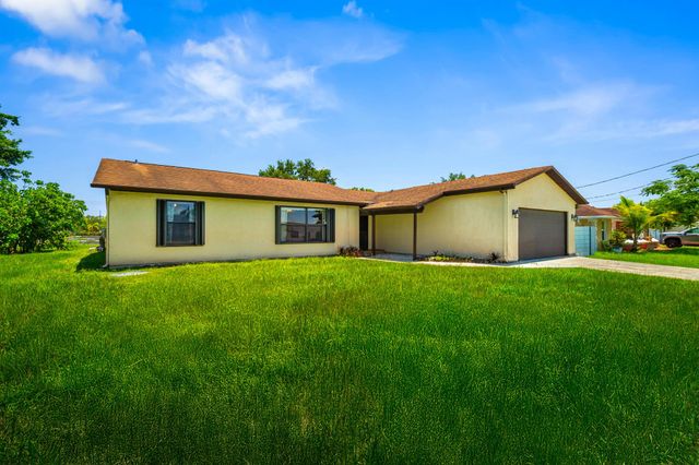441 SW Curtis Street, Port St Lucie, FL 34983
