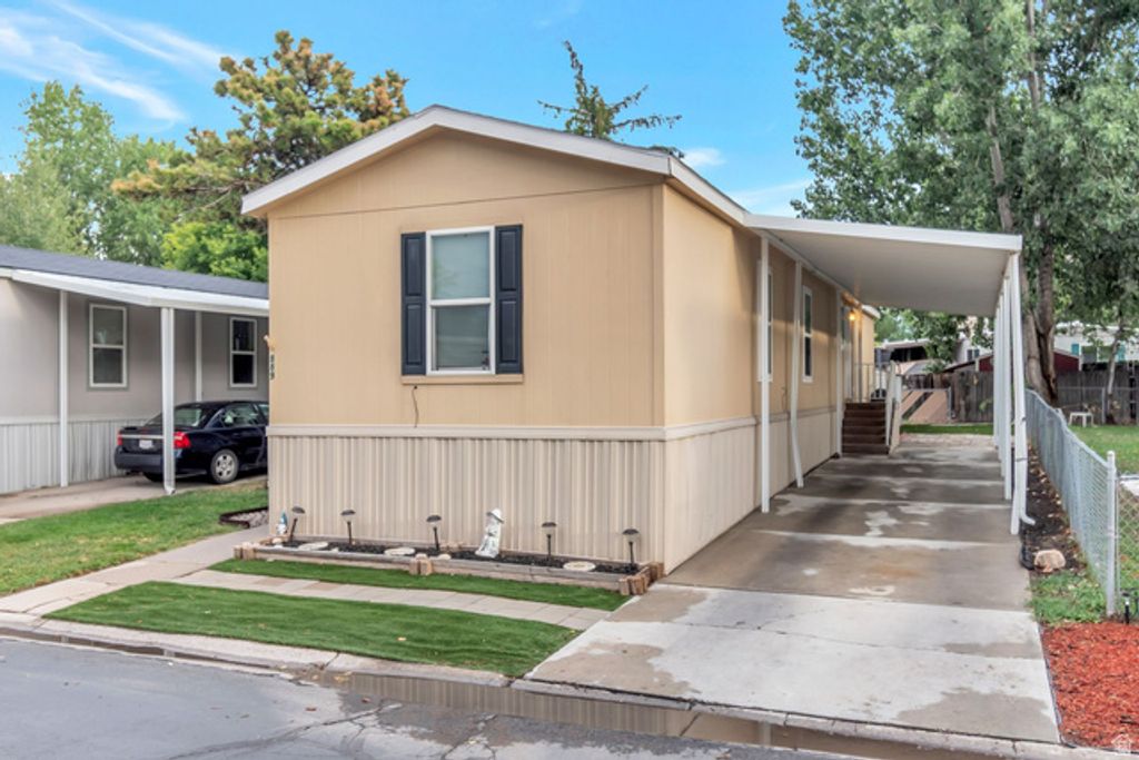 889 W STORM MOUNTAIN DR, Taylorsville, UT 84123 — exterior