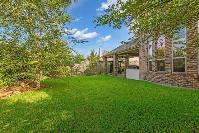 25203 Gaddis Oaks Drive, Spring, TX 77389