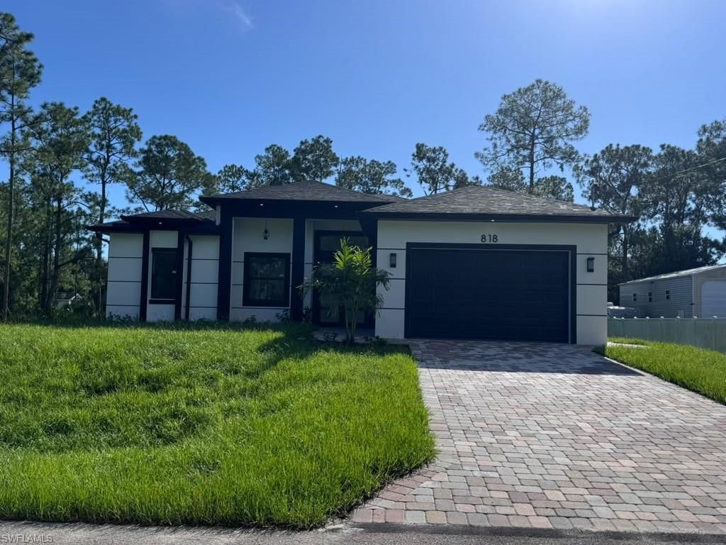 818 Columbus AVE, LEHIGH ACRES, FL 33972 — exterior