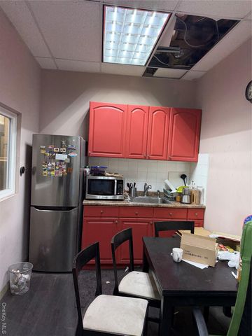 70-42 48th Avenue, Woodside, NY 11377