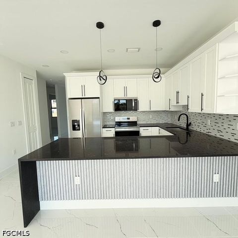 209-211 W 12th ST, Lehigh Acres, FL 33972