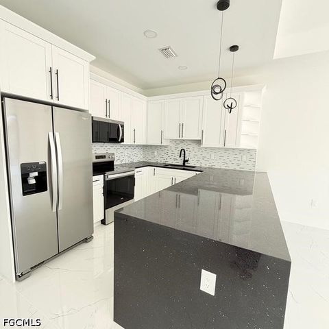 209-211 W 12th ST, Lehigh Acres, FL 33972