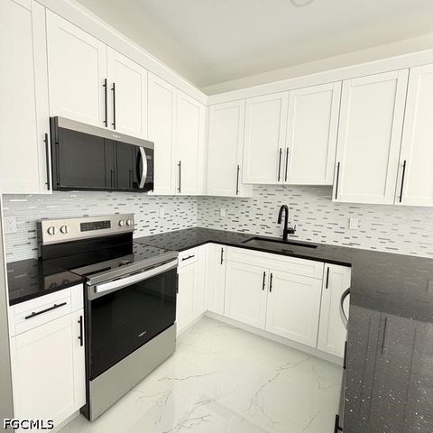 209-211 W 12th ST, Lehigh Acres, FL 33972
