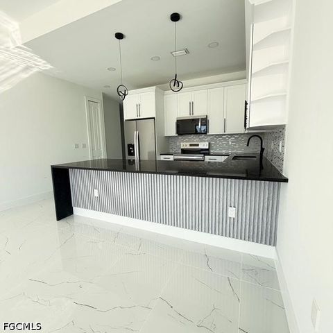 209-211 W 12th ST, Lehigh Acres, FL 33972