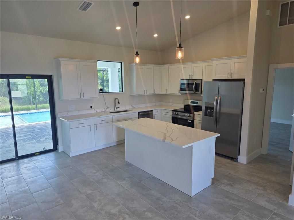 629 NW 28th TER, CAPE CORAL, FL 33993 — photo 4