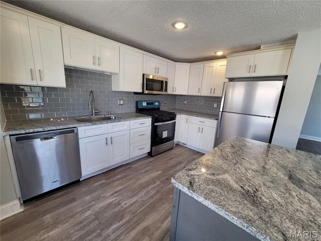 8687 Belhaven Drive, St John, MO 63114