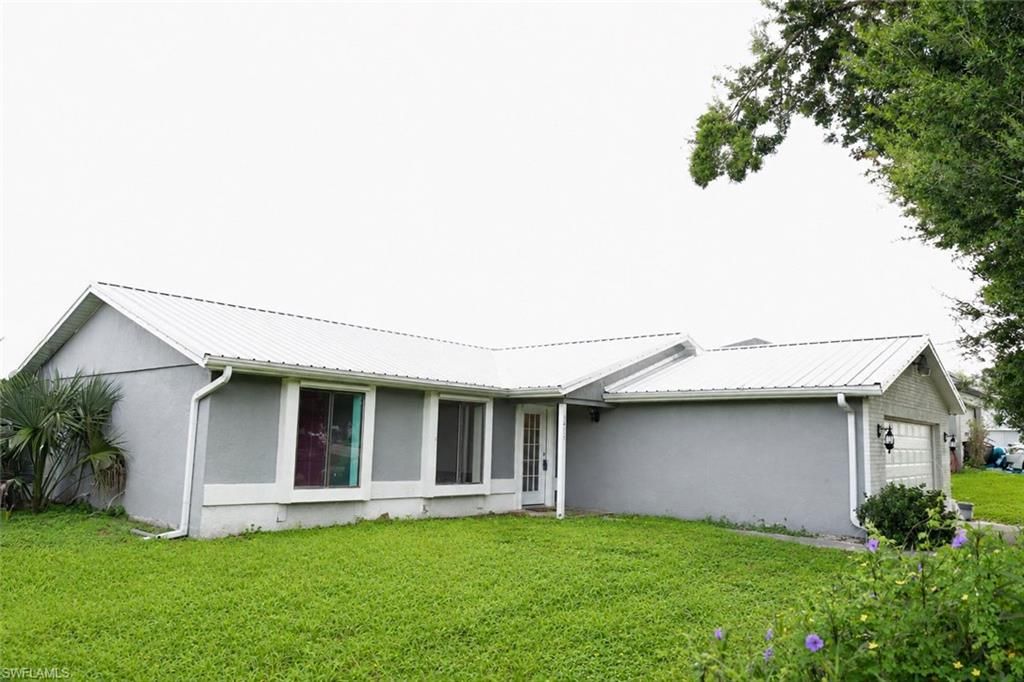 3414 22nd ST SW, LEHIGH ACRES, FL 33976 — exterior