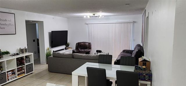 5005 Wiles Road 106, Coconut Creek, FL 33073