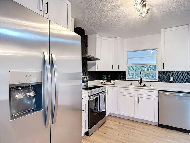 3551 OAKWOOD DRIVE, Wesley Chapel, FL 33543