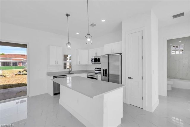 3310 11th ST W, Lehigh Acres, FL 33971