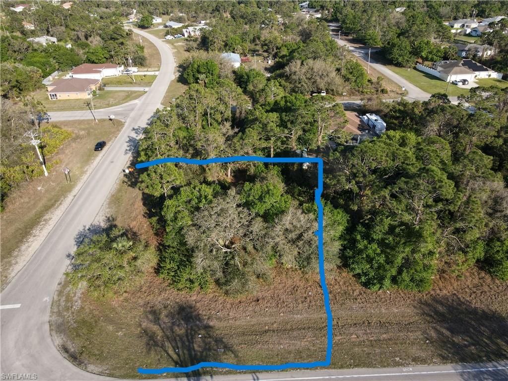 211 Bell BLVD S, LEHIGH ACRES, FL 33974 — exterior