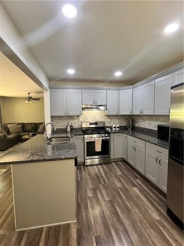 4857 Alpine SW Drive, Lilburn, GA 30047