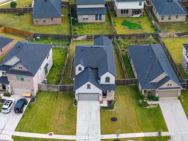 35425 Woodtrace Circle, Pinehurst, TX 77362