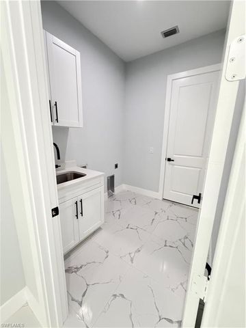 2864 66th AVE NE, Naples, FL 34120