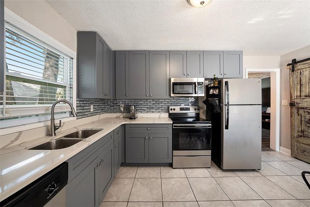 1209 E FLORA STREET, Tampa, FL 33604