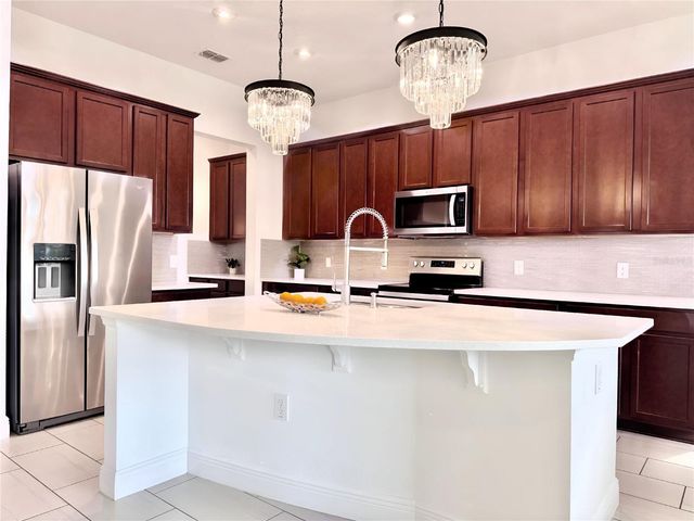 12941 WESTSIDE VILLAGE LOOP, Windermere, FL 34786