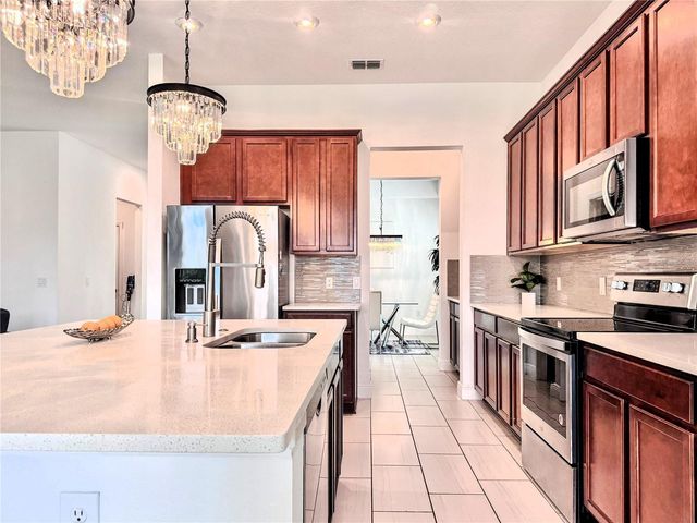 12941 WESTSIDE VILLAGE LOOP, Windermere, FL 34786