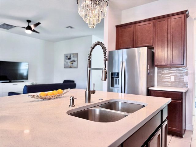 12941 WESTSIDE VILLAGE LOOP, Windermere, FL 34786