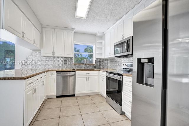 21461 Sawmill Ct, Boca Raton, FL 33498