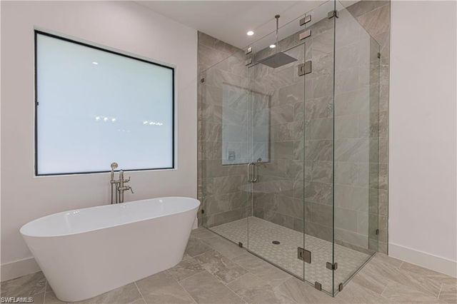 3098 Pine Tree DR, Naples, FL 34112