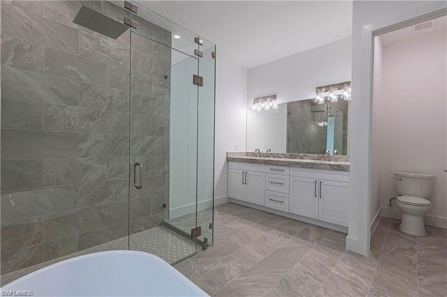 3098 Pine Tree DR, Naples, FL 34112
