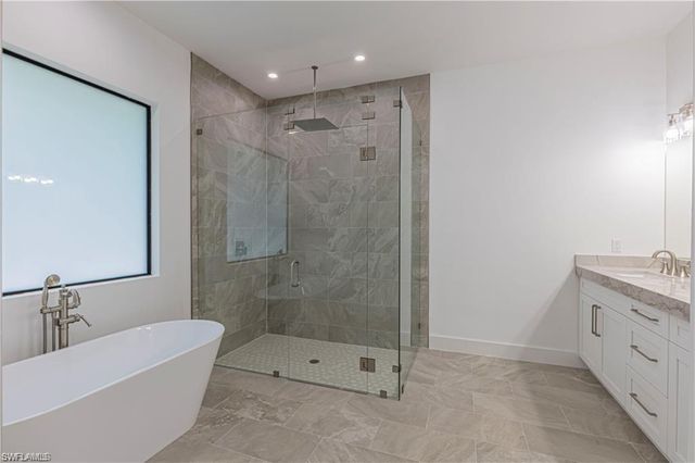 3098 Pine Tree DR, Naples, FL 34112