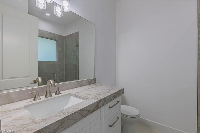 3098 Pine Tree DR, Naples, FL 34112